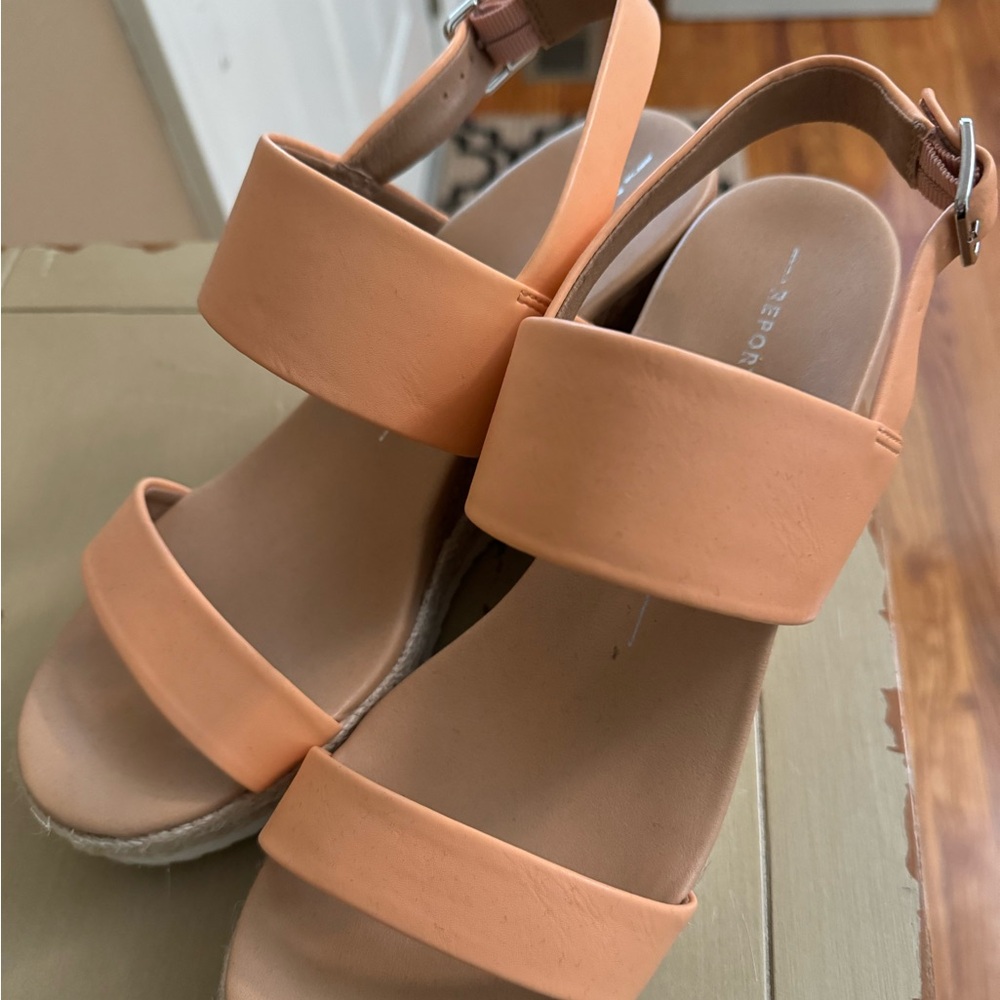 Sz 9 1/2 never worn, perfect condition, peachy orange color